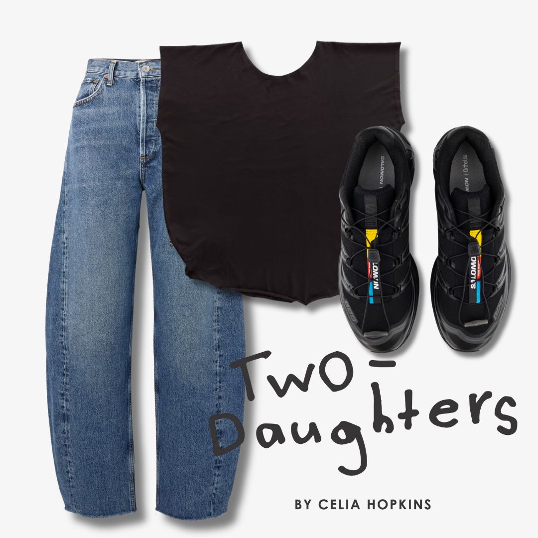 Black t-shirt, blue agolde barrel luna jeans, black salomon xt sneakers with colorful accents on a white background, featuring 'Two Daughters' by Celia Hopkins.