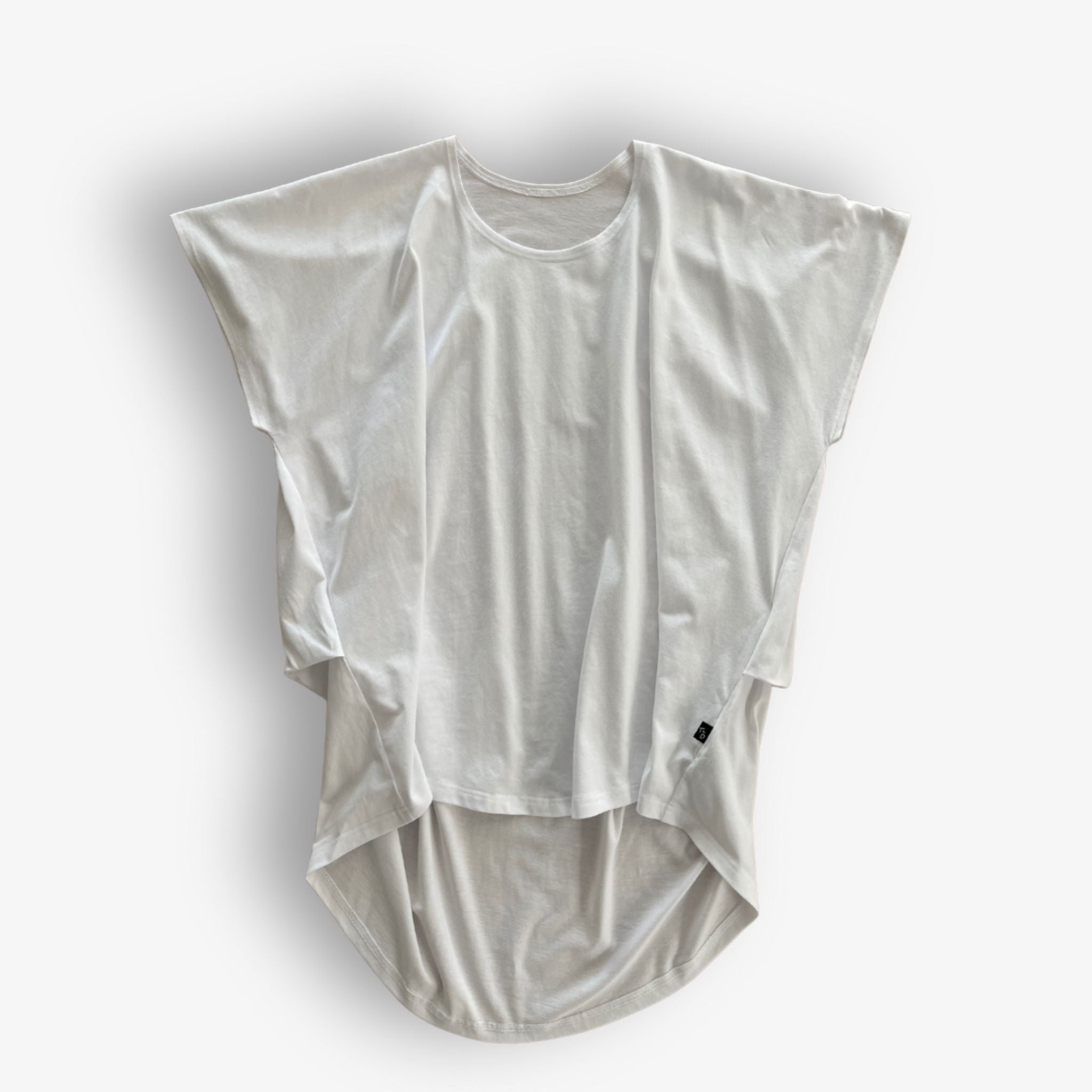 Close-up of white high low hem cotton t-shirt